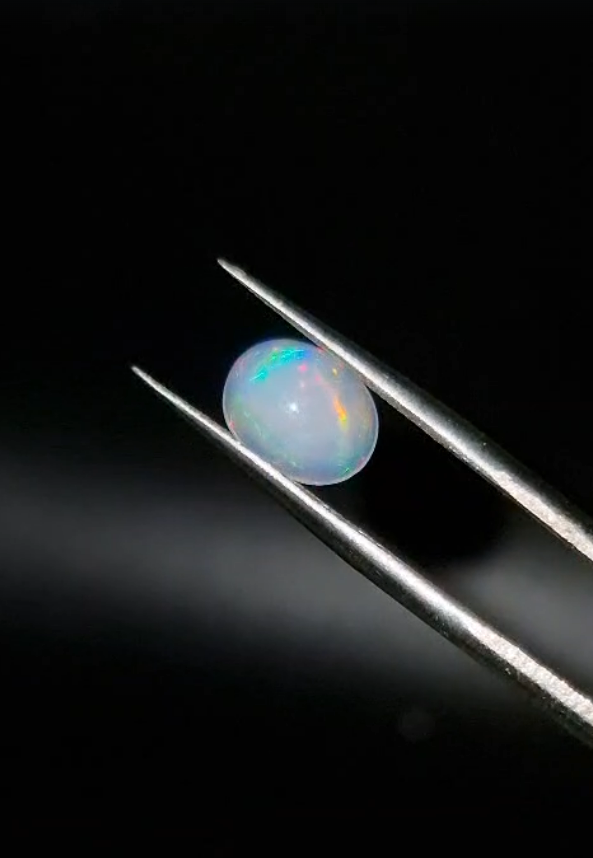 1.24ct 8.6x6.9mm Oval Natural Cabachon Ethiopian Opal