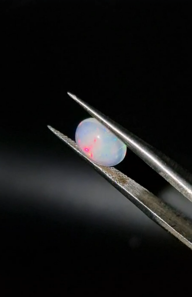 1.24ct 8.6x6.9mm Oval Natural Cabachon Ethiopian Opal