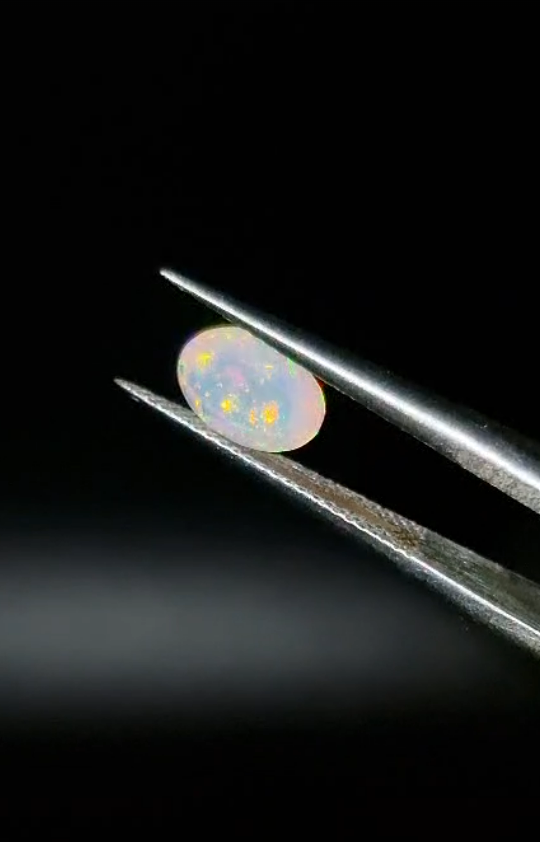 0.60ct 7x5.2mm Oval Natural Faceted Ethiopian Opal