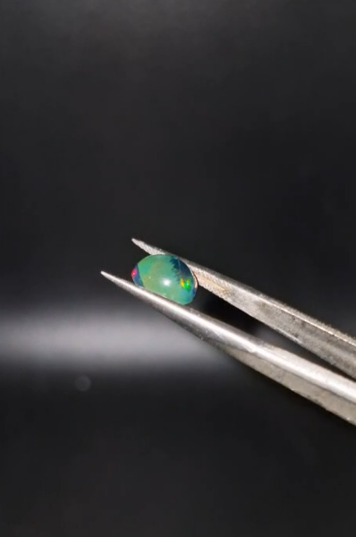 1.36ct 9x8mm Oval Natural Cabachon Ethiopian Opal