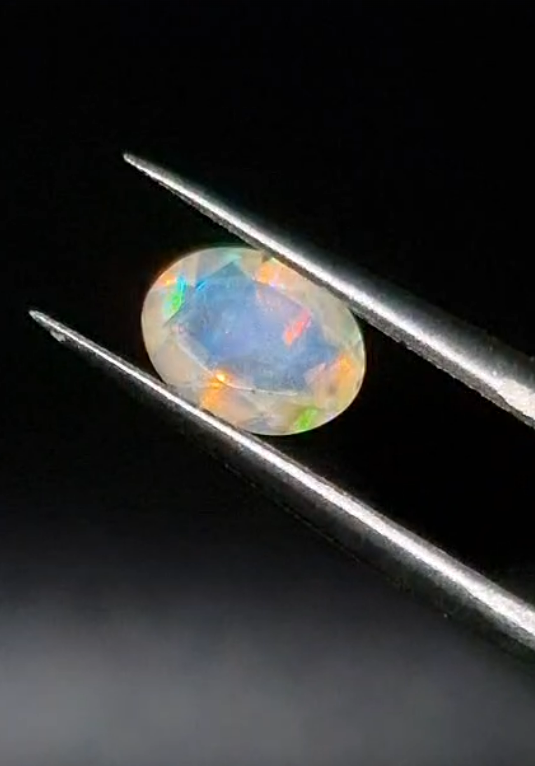 0.79ct 8x6mm Oval Natural Faceted Ethiopian Opal
