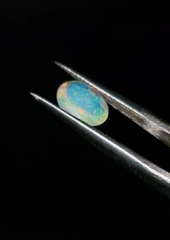 0.67ct 8.2x6.1mm Oval Natural Faceted Ethiopian Opal