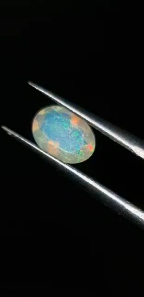 0.67ct 8.2x6.1mm Oval Natural Faceted Ethiopian Opal
