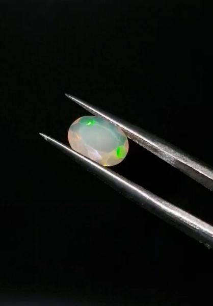 0.95ct 9x7mm Oval Natural Faceted Ethiopian Opal