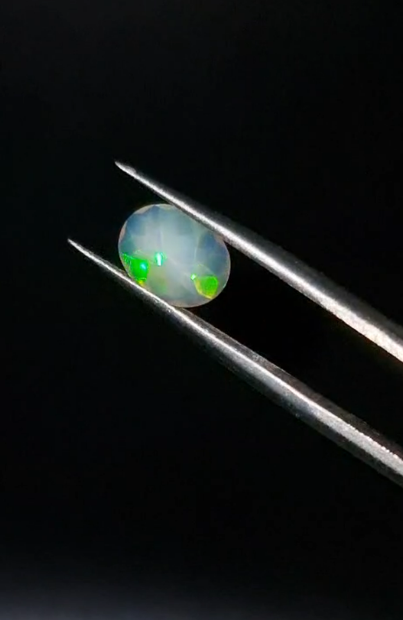 0.95ct 9x7mm Oval Natural Faceted Ethiopian Opal