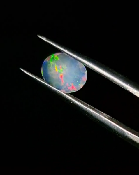 0.83ct 8.6x6.9mm Oval Natural Faceted Ethiopian Opal