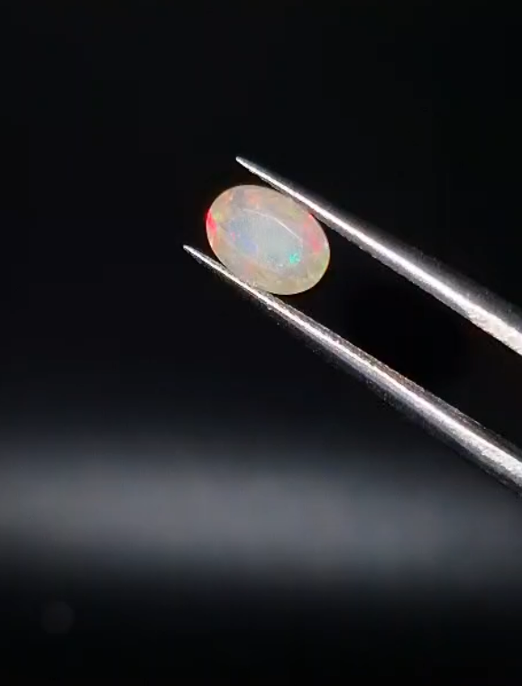 0.57ct 7.2x5.2mm Oval Natural Faceted Ethiopian Opal