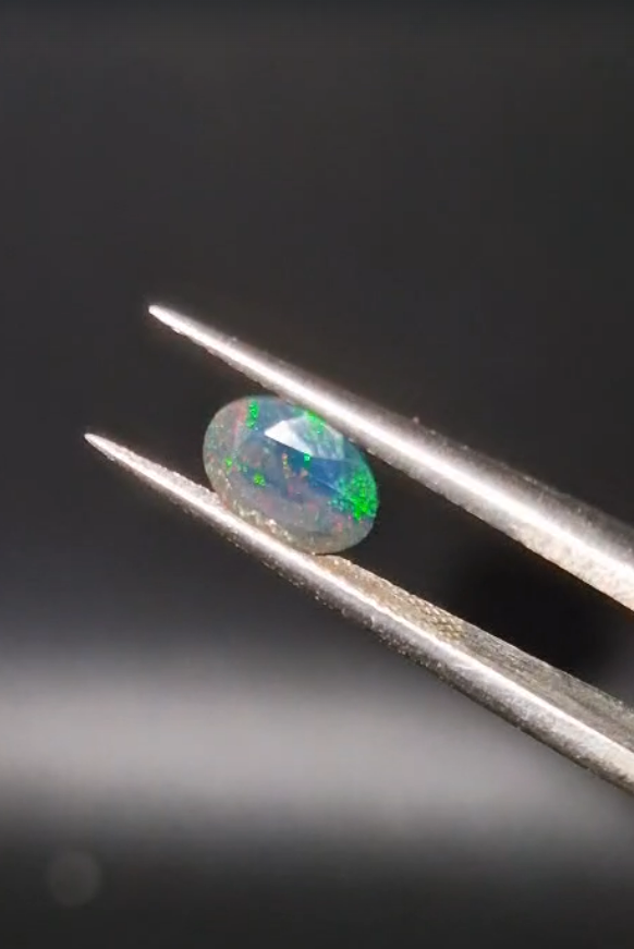 0.42ct 7x5.1mm Oval Natural Faceted Ethiopian Opal