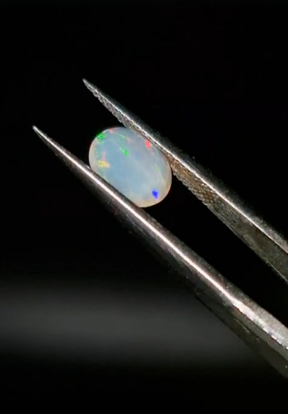 0.78ct 7.9x6.8mm Oval Natural Faceted Ethiopian Opal