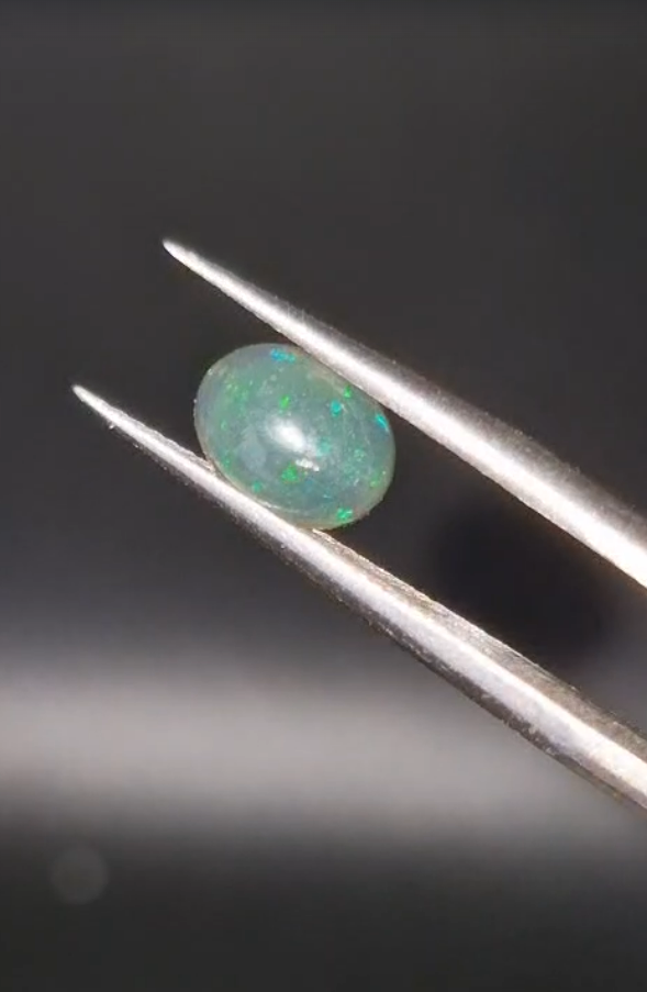0.70ct 8x6mm Oval Natural Cabachon Ethiopian Opal