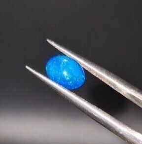 0.73ct 8x6mm Oval Natural Cabachon Ethiopian Opal