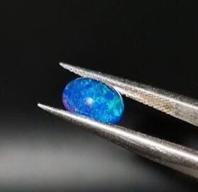 0.74ct 8x6mm Oval Natural Cabachon Ethiopian Opal