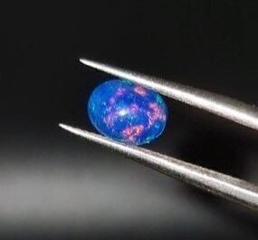 0.74ct 8x6mm Oval Natural Cabachon Ethiopian Opal