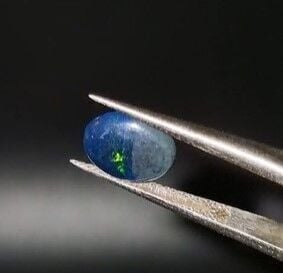 0.70ct 8.8x7mm Oval Natural Cabachon Ethiopian Opal