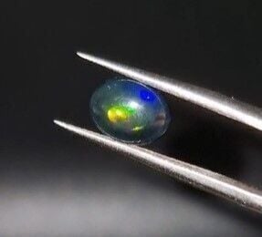 1.27ct 8.9x7.1mm Oval Natural Cabachon Ethiopian Opal