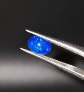 0.61ct 7.8x5.8mm Oval Natural Cabachon Ethiopian Opal