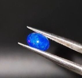 0.61ct 7.8x5.8mm Oval Natural Cabachon Ethiopian Opal