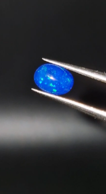 0.71ct 8.1x6mm Oval Natural Cabachon Ethiopian Opal