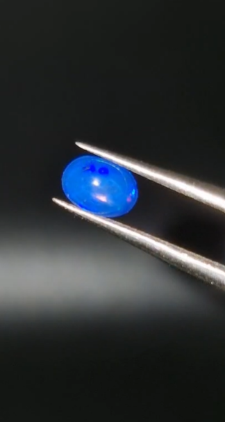 0.48ct 7x5mm Oval Natural Cabachon Ethiopian Opal