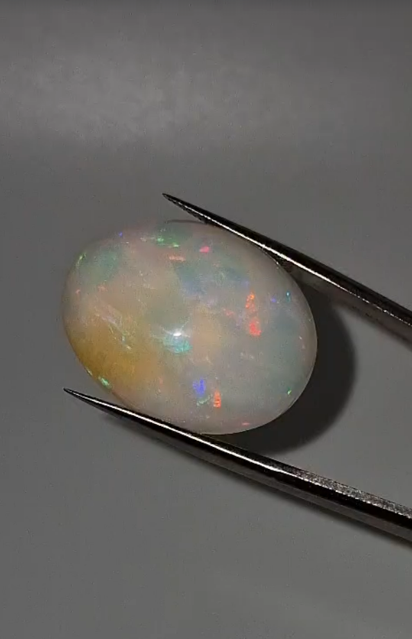 32.25ct 26.6x21.4mm Oval Natural Ethiopian Opal