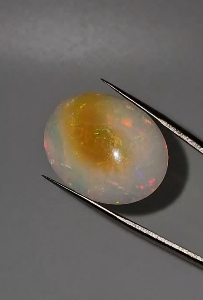 32.25ct 26.6x21.4mm Oval Natural Ethiopian Opal