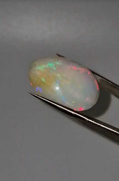 32.25ct 26.6x21.4mm Oval Natural Ethiopian Opal
