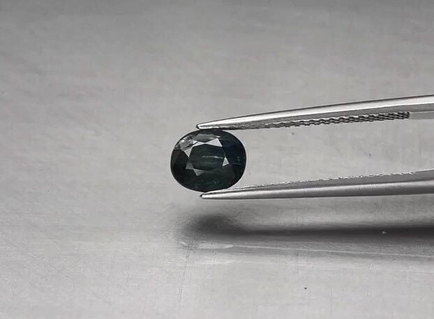 1.28ct 6.5x5.5mm Oval Bluish Green Sapphire Unheated Tanzania