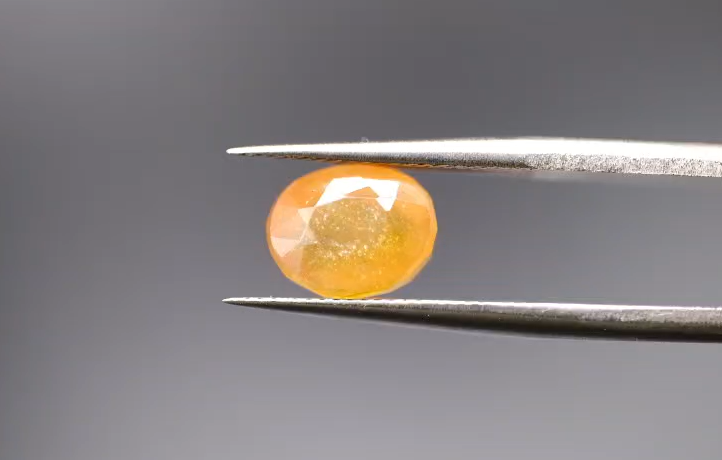 3.80ct 8.5x6.8mm Oval Yellow Natural Sapphire  (Heated Glass Filling)