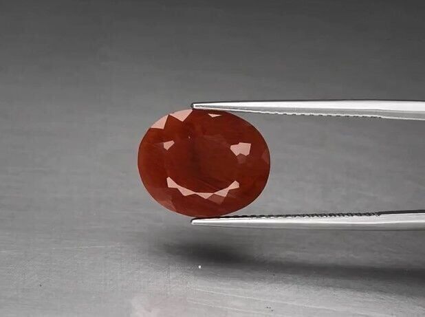 4.17ct 12.8x10.5mm Oval Natural Orange Andesine, Africa