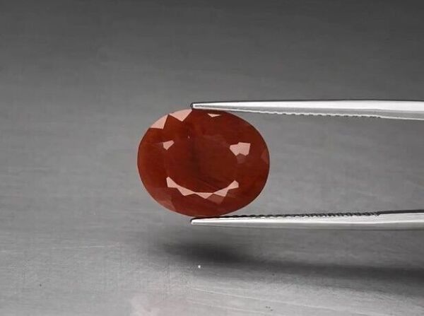 4.17ct 12.8x10.5mm Oval Natural Orange Andesine, Africa