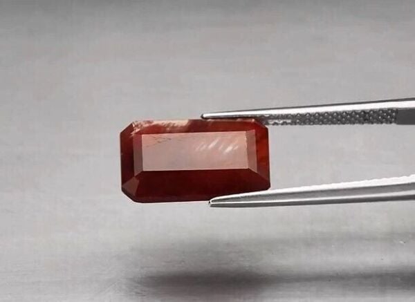 4.38ct 13.7x8.8mm Octagon Natural Orange-Red Andesine, Africa