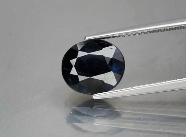 3.93ct 9.6x8.3mm Oval Deep Blue Sapphire Africa, Heated