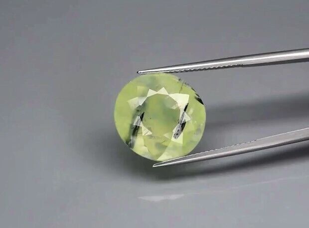 14.67ct 16x15mm Oval Natural Green Prehnite with Black Needles, Africa