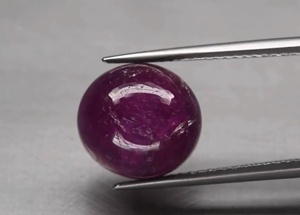 8.73ct 11x10mm Oval Cabochon Reddish Purple 6 Ray Star Sapphire Unheated Guinea
