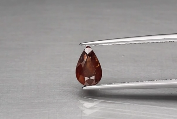 1.36ct 8x5.2mm Pear Purplish Orange Sapphire Unheated Mozambique