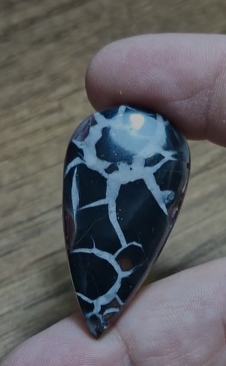 56.05ct 44.6x24.2mm Pear Black Septerian