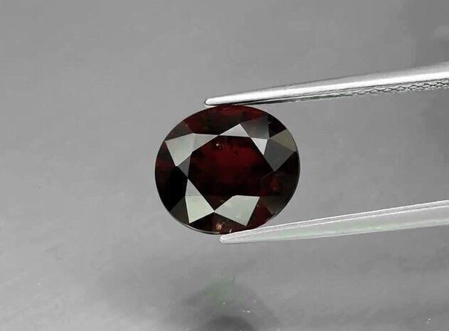 3.52ct 9.6x8.5mm Oval Natural Orangish Red Garnet, Tanzania