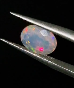 1.21ct 9x7mm Oval Faceted Natural Ethiopian Opal