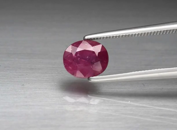 1.61ct 7x6mm Oval Reddish Purple Sapphire Unheated Madagascar
