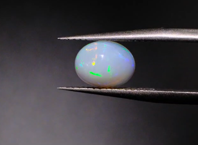 1.24ct 8.8x6.8mm Oval Natural  Ethiopian Opal