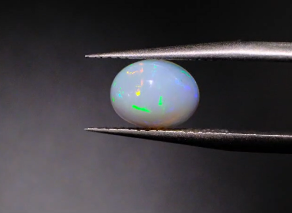 1.24ct 8.8x6.8mm Oval Natural  Ethiopian Opal