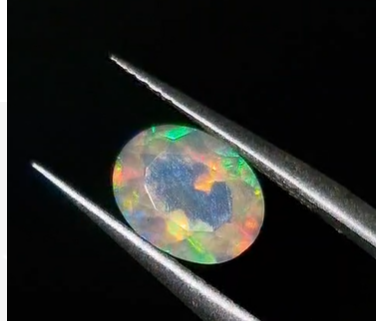 1.33ct 9x7mm Oval Faceted Natural Ethiopian Opal