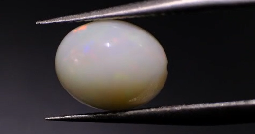 1.41ct 10x8mm Oval Natural  Ethiopian Opal