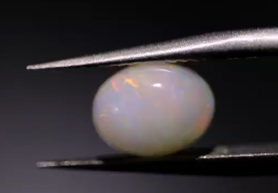 1.46ct 9.1x7mm Oval Natural  Ethiopian Opal