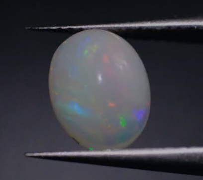 1.52ct 9.8x7.8mm Oval Natural  Ethiopian Opal
