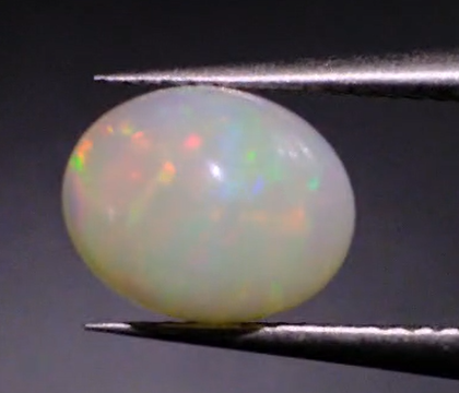 1.76ct 10x8mm Oval Natural  Ethiopian Opal