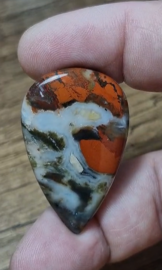 48.70ct 41.4x25.8mm Natural Pear Red Jasper