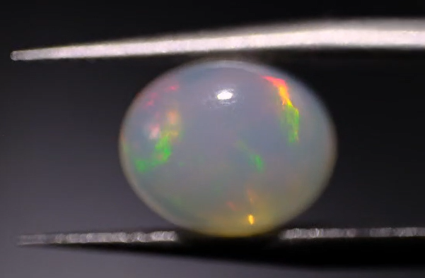 1.83ct 10.2x8.4mm Oval Natural  Ethiopian Opal
