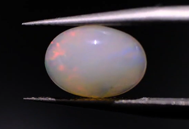 1.96ct 11.3x8mm Oval Natural  Ethiopian Opal