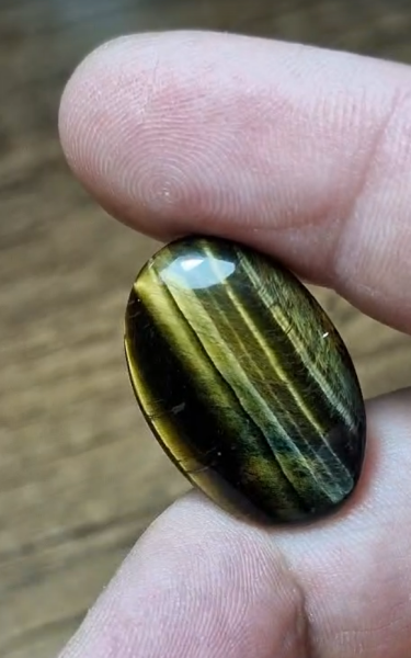 17.40ct 25.9x17.2mm Oval Natural Bi Color Tiger Eye